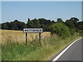 Wattisfield Village Name sign on the A143 Bury Road in IP22 1NL
