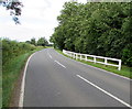 White fence on the east side of Bath Road, Frocester in GL10 3BE