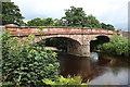 The Eden flowing under the sandstone bridge near Bolton in CA16 6BQ