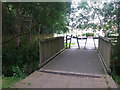 Bridge over a stream by Alwoodley village green in LS17 7QF