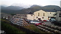 Stacked barrels at Ben Nevis Distillery in PH33 7ND