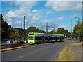 Tram leaving Addington Village in CR0 9AE
