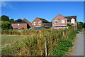 Houses beside footpath on the very edge of Newbury in RG14 5NA