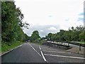 Slip road from the A78 at the junction by Wemyss Plantation in PA18 6BL