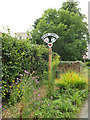 Weston Longville Village sign in NR9 5JU