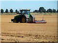 Tractor cultivating a  stubble field off Highbridge Road in PE38 0AJ