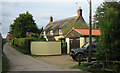 Thatched cottage near Glebe Farm in Hanworth