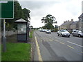 Bus stop and shelter on Main Street, Cornhill on Tweed in TD12 4UQ
