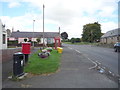 Elizabethan postbox and telephone box on the A698, Cornhill on Tweed in TD12 4UQ