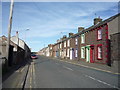Terraced housing on the A596, Aspatria in CA7 3GD