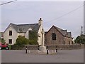 Memorial cross in The Square, Ashreigney in EX18 7LH