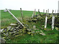 Stile and fallen signpost on Elland FP59, Stainland in HX4 9QE