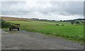 View across a valley to Butterley Top Farm in DE4 5GF