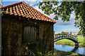 An old outbuilding and a bridge, near Doddington Hall in LN6 4RU