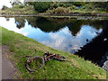 Bits of an old bike has been dredged from the Leeds to Liverpool canal in L21 9NL