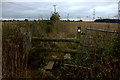 Stile on overgrown footpath in HP16 0QT