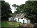 Old farm buildings alongside the  A5 at Pentre Berw in LL60 6HY