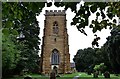 Yarburgh, St. John the Baptist Church: The early c15th sandstone tower in Yarburgh
