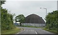 Round building by the A137 in CO7 7NT