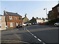 The junction of Main Street (B706) with Stewarton Road (A735) in Dunlop in Dunlop
