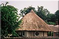 Charborough Park: thatched round lodge in BH20 7EL
