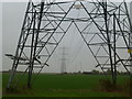 Pylons to the Romney Marsh array of wind turbines in TN31 7PD