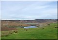 The dam on Lower Swineshaw Reservoir in SK14 6SG
