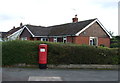 Elizabeth II postbox on Dane Bank Avenue, Crewe in CW2 6PP