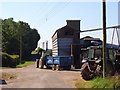 Buildings and tractors at Park Farm, Over Wallop in SO20 8DX