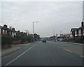 A56 Manchester Road heading south in BL9 9UA