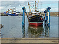 Launching the fishing boat "Illustrious" into Buckie Harbour in AB56 1TU