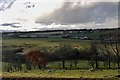 Sloping fields at Meadow Burn in KA18 3BL