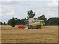 Combine harvesting wheat field in IP25 7QG