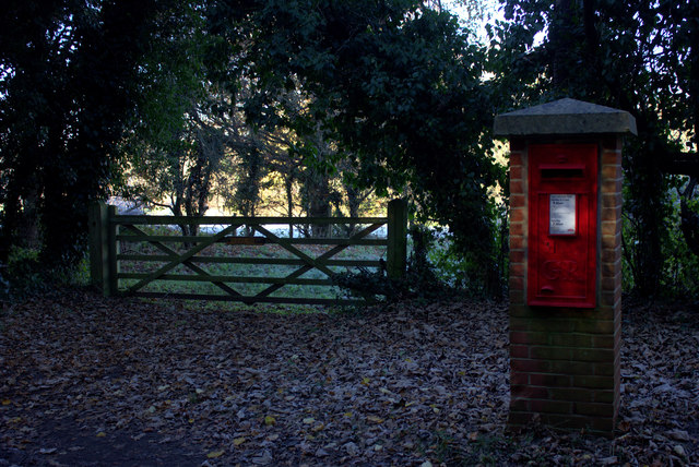 Postbox and gate in Blighton Lane in GU10 1LF
