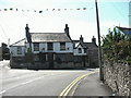 Road junction at sharp bend in the High Street in Llanidan Community