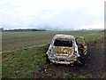 Burnt out Fiat 500 in a field off Slaynes Lane in DN10 6DJ