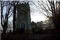 All Saints church through the trees in MK17 9LQ