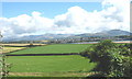 View over farmland towards the Menai Straits from Cae Mawr Farmhouse in LL61 6LQ