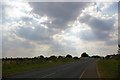 Scattering of sunlight by cloud over road in PE34 3PQ