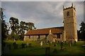 St Mary's church and trees in PE33 9HJ