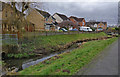 Houses next to Whetstone Brook, Whetstone in LE8 6LJ