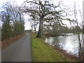 Public footpath by lake at Ewhurst Manor in BN5 9BS