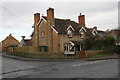 Houses at Tower Hill / Windrush Valley Road junction in OX28 5YH