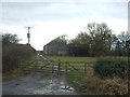 Farm track and buildings, Hornhill Top in YO25 9TS