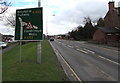 Directions sign facing eastbound traffic on Llanidloes Road, Newtown in SY16 1JE