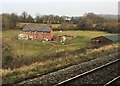 View from a Cardiff-Swansea train - fields near Ty'n y Caeau in CF35 5EP