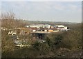 View from a Cardiff-Swansea train - industrial estate at Pyle in CF33 6BL