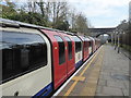 A Central line train at Chigwell station in IG7 6AD