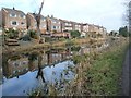 Brampton Crescent houses reflected in the Elsecar Branch in S73 0RN