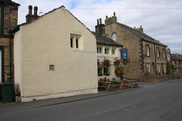 The New Inn and houses, Main Street in BD20 8LJ